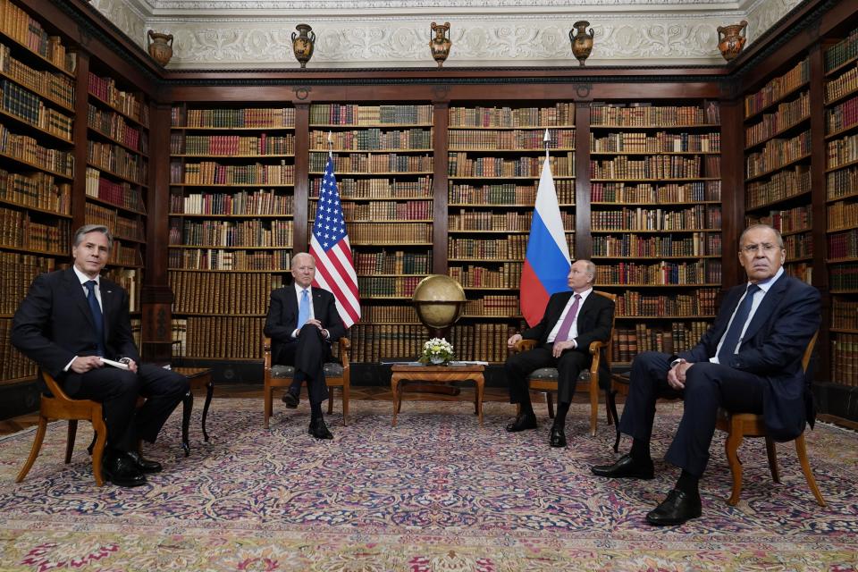 FILE - President Joe Biden and Secretary of State Antony Blinken, left, meet with Russian President Vladimir Putin and Foreign Minister Sergey Lavrov, at the 'Villa la Grange', June 16, 2021, in Geneva, Switzerland. After winding down 20 years of "endless" war in which the vast majority of Americans felt little impact on their daily lives, President Joe Biden now finds the U.S. mired in a conflict in Ukraine -- albeit without any U.S. troops on the ground -- that could prove to have more far-reaching effects on American lives than Iraq or Afghanistan ever did. (AP Photo/Patrick Semansky, File)