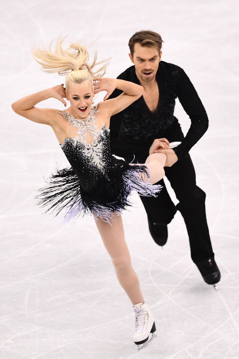 <p>Britain’s Penny Coomes and Britain’s Nicholas Buckland compete in the ice dance short dance of the figure skating event during the Pyeongchang 2018 Winter Olympic Games at the Gangneung Ice Arena in Gangneung on February 19, 2018. / AFP PHOTO / ARIS MESSINIS </p>