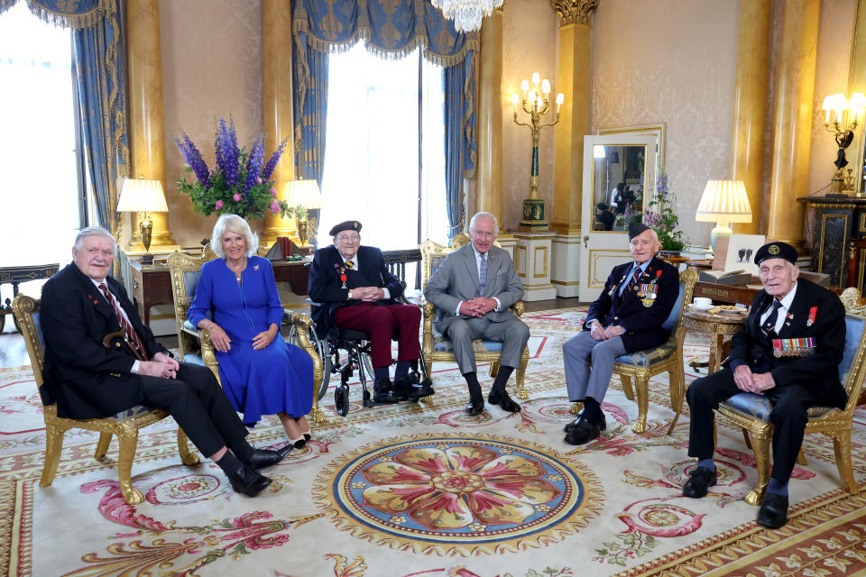 Arthur Oborne, the Queen, Jim Miller; the King, Bernard Morgan, and John Dennett at Buckingham Palace ahead of D-Day anniversary