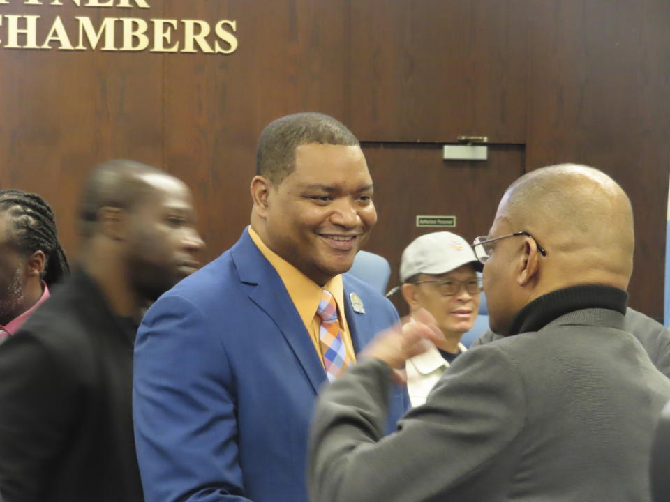 Atlantic City Mayor Marty Small, center, greets supporters after a news conference in Atlantic City, N.J., on April 1, 2024. Small said search warrants executed at his home last week by the county prosecutor's office involved "a family issue" for which the Smalls are in counseling and dealing with state child welfare authorities. On April 15, 2024, Small and his wife LaQuetta were charged with child endangerment and assault regarding their teenage daughter. (AP Photo/Wayne Parry)