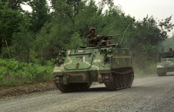 PHOTO: M113 armored personnel carriers with the New Jersey Army National Guard, travel on a road at Fort Drum, N.Y., June 8, 2000.  (U.S. Air National Guard )