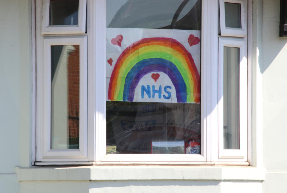  View of a rainbow sign displayed on a window as a message of hope during the Coronavirus (COVID-19) lockdown crisis. United Kingdom has confirmed 153k coronavirus cases with 20,732 deaths. (Photo by Keith Mayhew / SOPA Images/Sipa USA) 