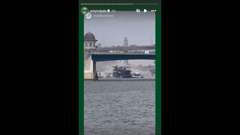 A video posted to social media shows a charred yacht in the Miami River.