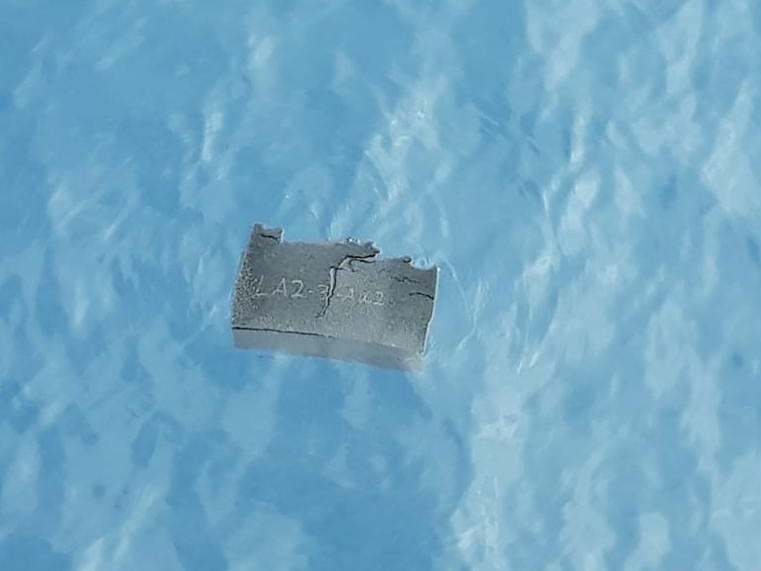 Handout picture showing a part of a fuel tank, allegedly from the Chilean Air Force C-130 Hercules cargo plane: Chilean Air Force/AFP via Getty