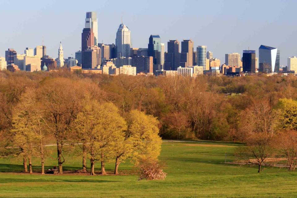<p>Getty Images/iStockphoto</p> Sunset at West Fairmont Park with skyline of Philadelphia.