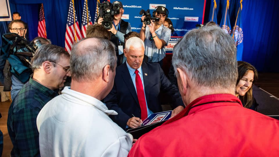 Mike Pence greets supporters and signs autographs after speaking at a campaign event in Derry, New Hampshire, on June 9, 2023. - Joseph Prezioso/AFP/Getty Images