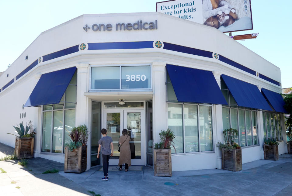 People enter a One Medical office on July 21, 2022 in Oakland, California. Amazon announced plans to acquire health provider One Medical for an estimated $3.9 billion.