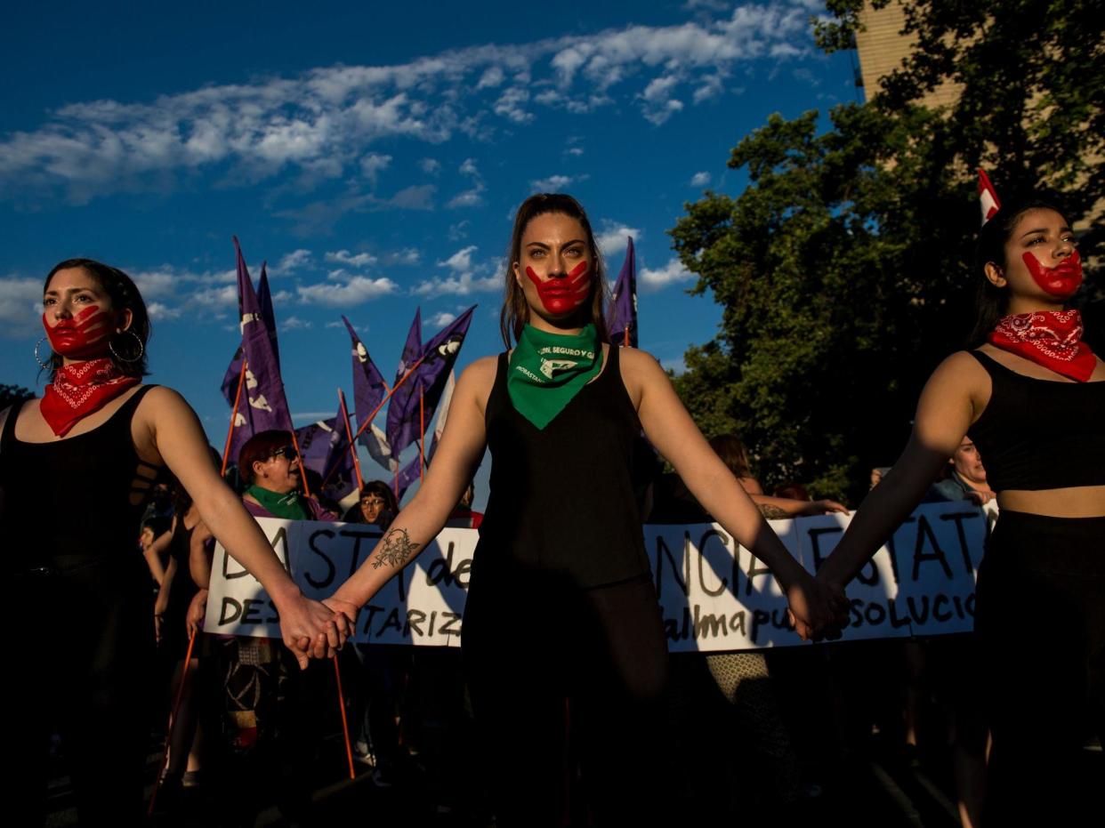 Activists take part in a march on the eve of the commemoration of the International Day for the Elimination of Violence Against Women, in Santiago, on 22 November 2018: Getty Images