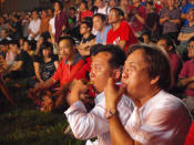 SDP supporters whistling and cheering on the candidates. Sunday , May 1. (Yahoo! photo/ Aeron Chew)