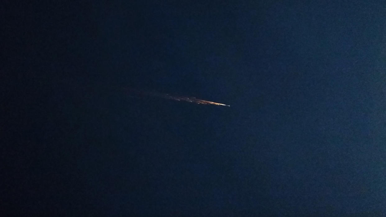  Jennifer M. captured this photo of a fireball in Earth's skies from Phelan, California on April 2, 2024 and forwarded it to the American Meteor Society. The fireball was caused by the reentry of China's Shenzhou 15 orbital module, experts say. 