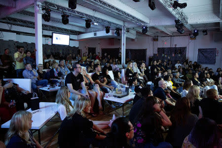 Fans watch the final episode of Game of Thrones at a watch party in the Manhattan borough of New York City, U.S., May 19, 2019. REUTERS/Caitlin Ochs