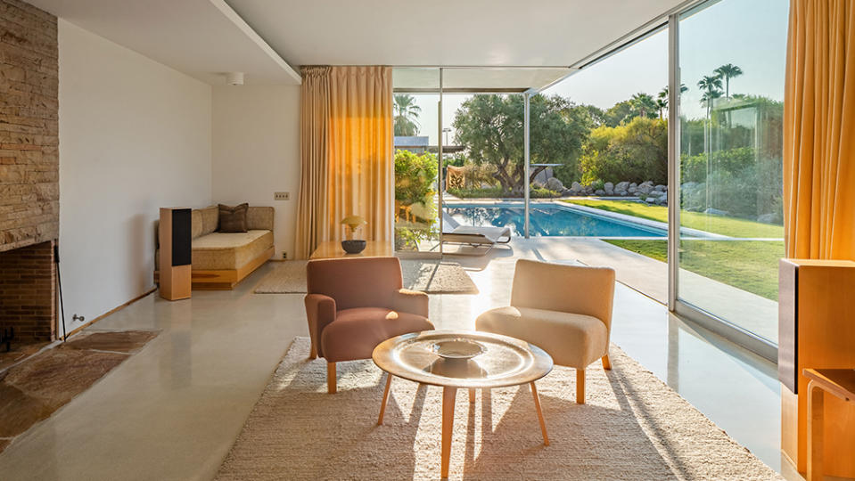 The Kaufmann House living room offers easy access to the famed pool. - Credit: Photo: Daniel Solomon/Vista Sotheby's International Realty