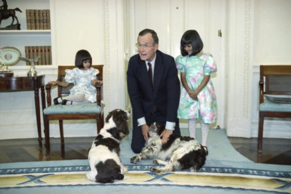 President George Bush with his dogs, Millie and Ranger, in 1991.