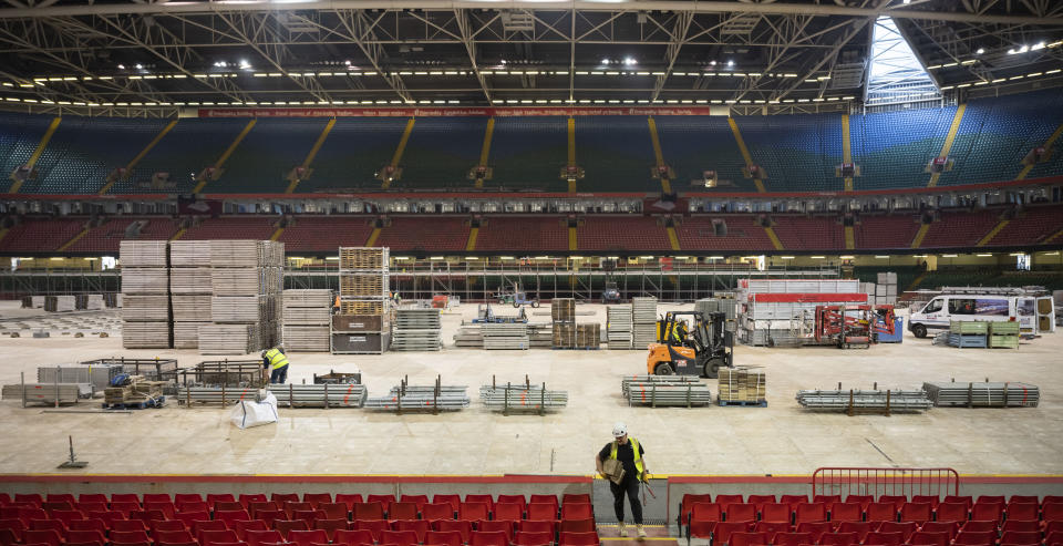 CARDIFF, WALES - APRIL 09: A general view as workers prepare the Dragon's Heart hospital on April 9, 2020, in Cardiff, Wales. The Principality Stadium is being converted into 2000-bed field hospital for coronavirus patients called the Dragon's Heart Hospital. It is expected to start taking patients from Sunday. There have been over 60,000 reported cases of the COVID-19 coronavirus in the United Kingdom and over 7,000 deaths. The country is in its third week of lockdown measures aimed at slowing the spread of the virus. (Photo by Matthew Horwood/Getty Images)