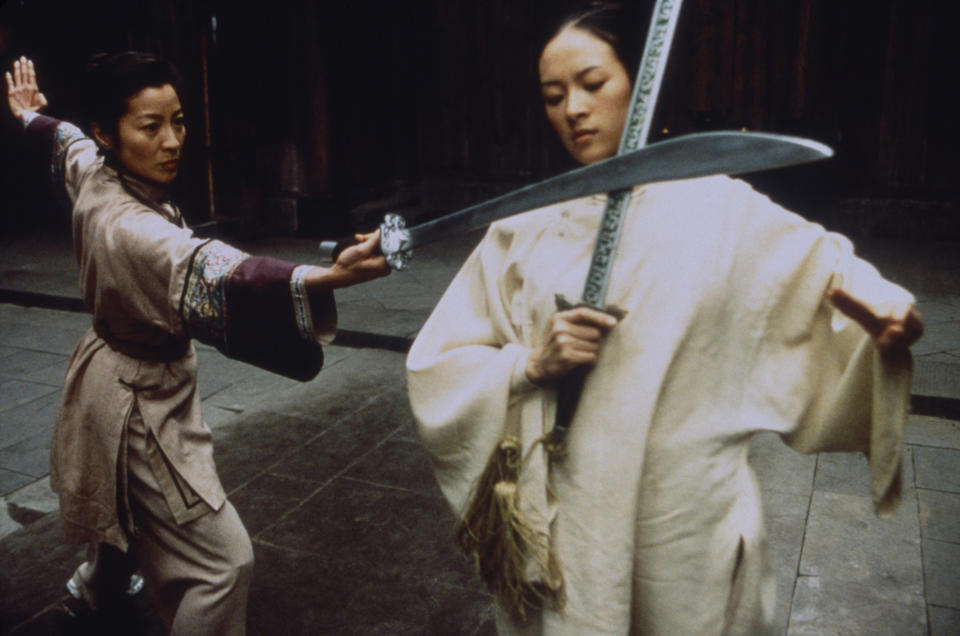 Yeoh in Crouching Tiger, Hidden Dragon, alongside Zhang Ziyi in 2000.<span class="copyright">Chan Kam Chuen—Sony Pictures/Everett Collection</span>