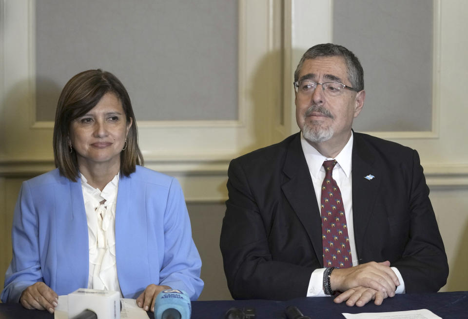 President-Elect Bernardo Arevalo, right, and his Vice President Karin Herrera listen to a question during a press conference in Guatemala City, Monday, Aug. 28, 2023. The Central American country's top electoral tribunal declared Arevalo the winner of the presidential election just hours after another part of the government suspended his Seed Movement party. (AP Photo/Moisés Castillo)