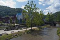 <p><a href="https://www.tripadvisor.com/Tourism-g59630-Welch_West_Virginia-Vacations.html" rel="nofollow noopener" target="_blank" data-ylk="slk:This town;elm:context_link;itc:0;sec:content-canvas" class="link ">This town</a> used to be all about coal mining, but today it's rich in history thanks to the Kimball War Memorial. We recommend grabbing a bite and sitting next to the Elkhorn Creek that flows through the town and into the Tug Fort.</p>