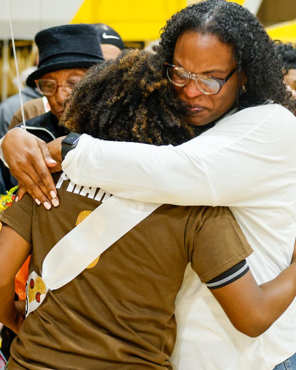 Jameelah Pharms shares a special moment with her mother during senior night festivities at Stagg High School before their game against Cesar Chavez high in Stockton,CA