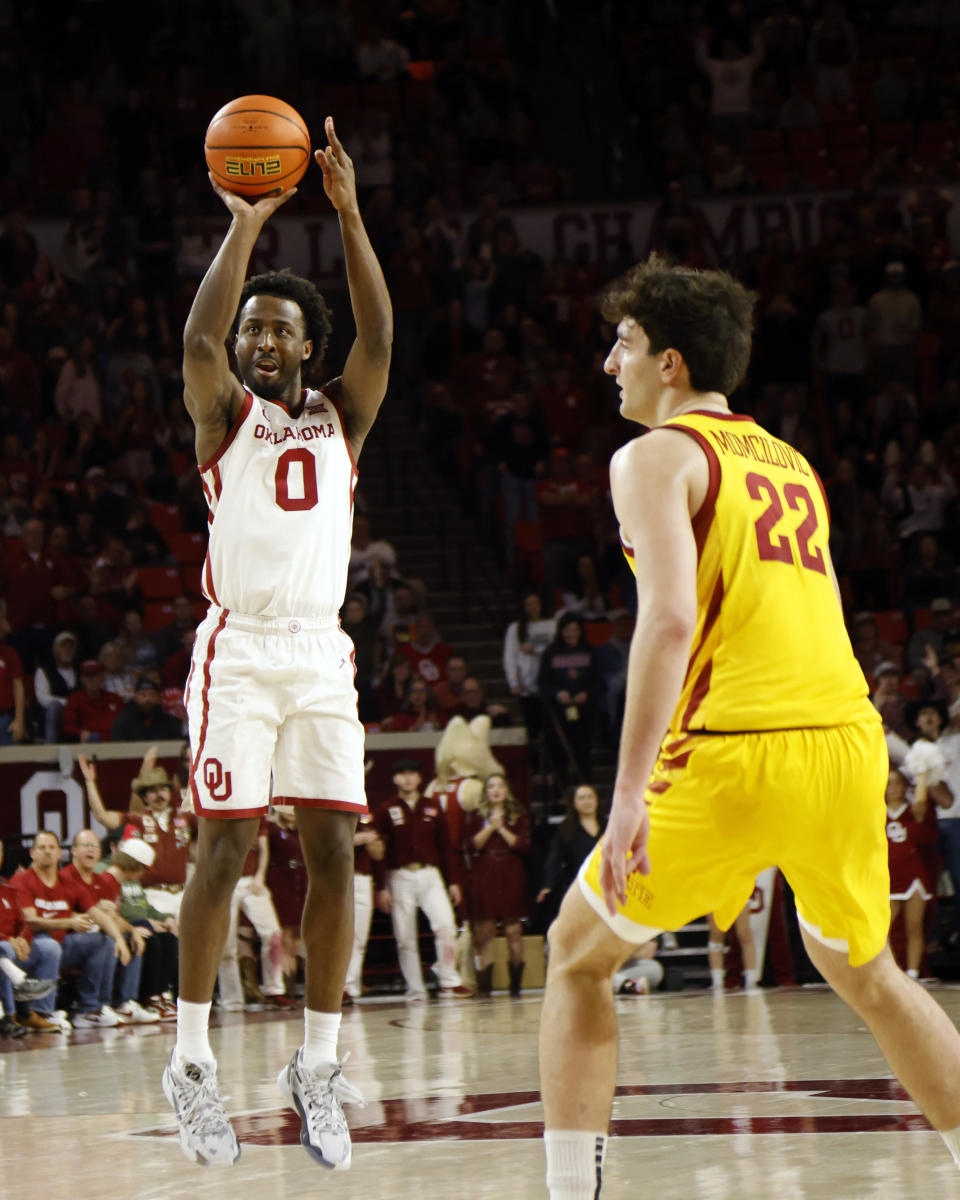 Oklahoma guard Le'Tre Darthard (0) looks to shoot near Iowa State forward Milan Momcilovic (22) during the second half of an NCAA college basketball game, Saturday, Jan. 6, 2024, in Norman, Okla. (AP Photo/Nate Billings)