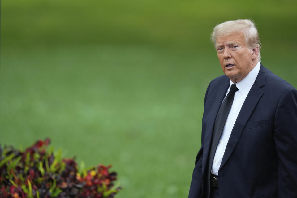 Former President Donald Trump arrives for the funeral of the former first lady's mother, Amalija Knavs, at the Church of Bethesda-by-the-Sea in Palm Beach, Fla., Thursday, Jan. 18, 2024. (AP Photo/Rebecca Blackwell)