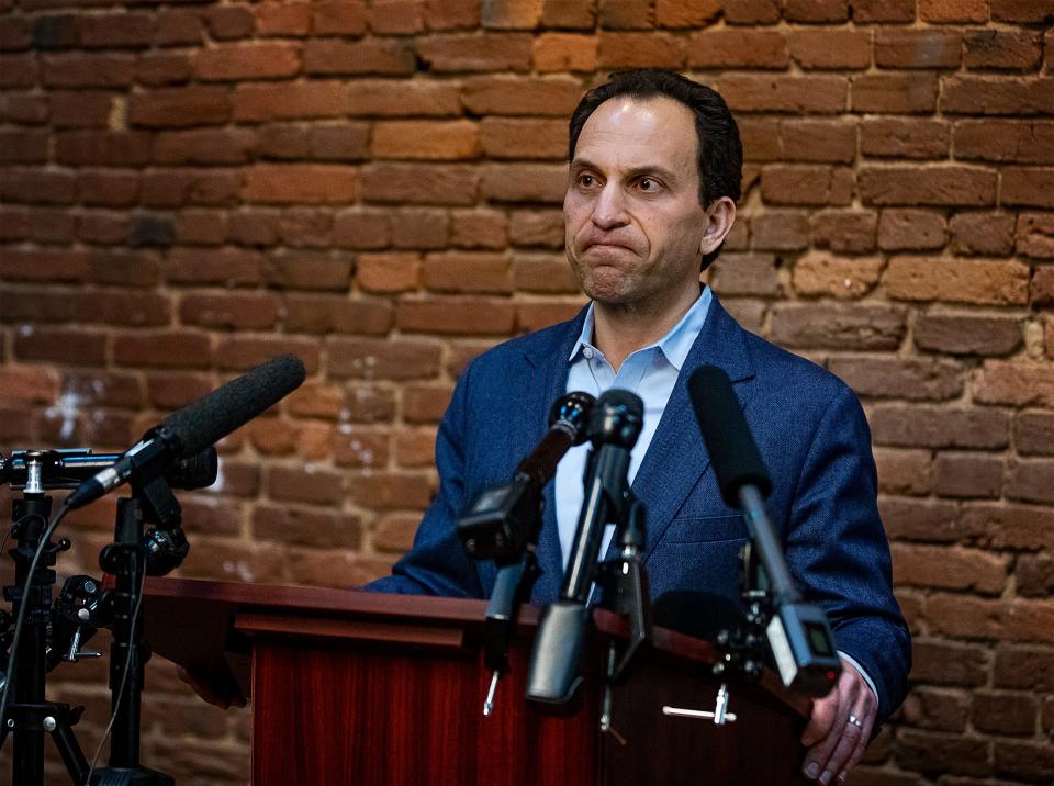 Louisville mayoral candidate Craig Greenberg pauses with emotion while addressing the media about the shooting at his campaign headquarters on Monday morning, saying: "I just want to get home to my wife and sons." Feb. 14