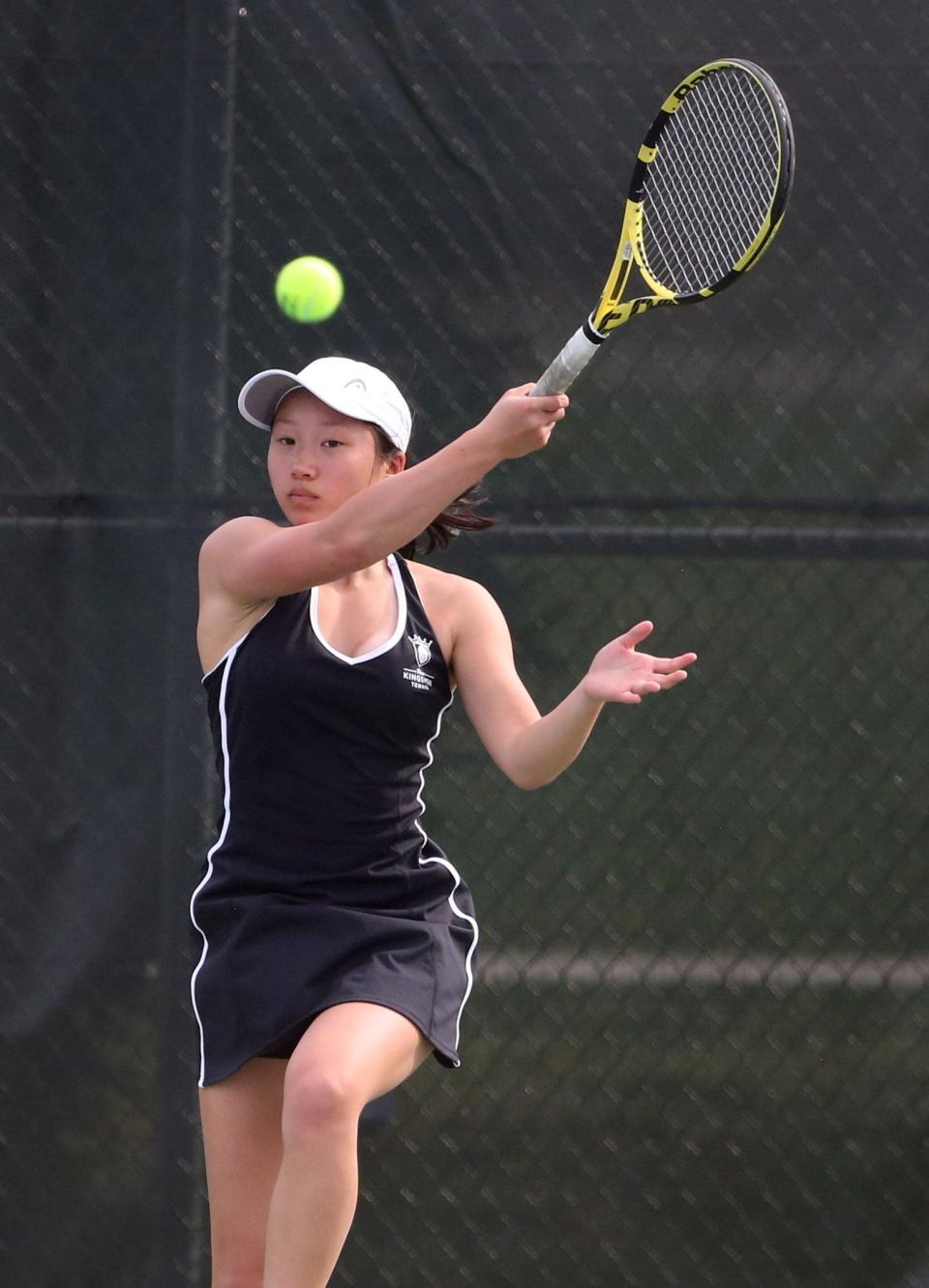 Anna Yoon, No. 3 singles player for Penn, makes a shot against Saint Joseph's Lily Mayfield Thursday, April 20, 2023, in an NIC girls tennis match at Leeper Park Tennis courts in South Bend.