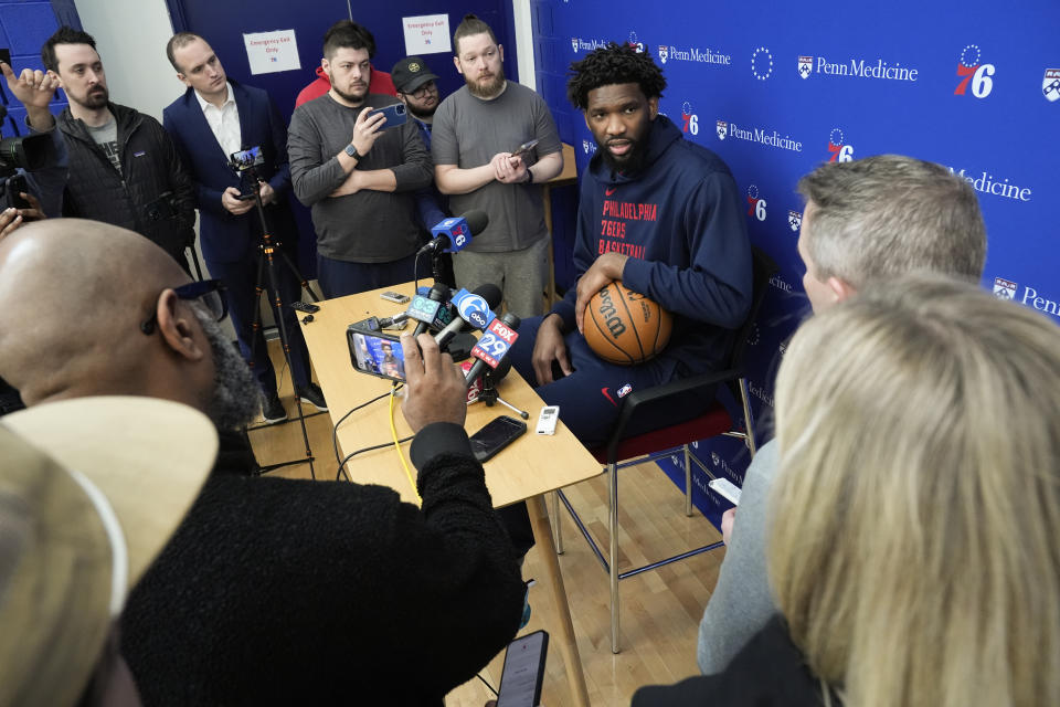 Philadelphia 76ers center Joel Embiid speaks with members of the media at the NBA basketball team's practice facility, Thursday, Feb. 29, 2024, in Camden, N.J. (AP Photo/Matt Rourke)