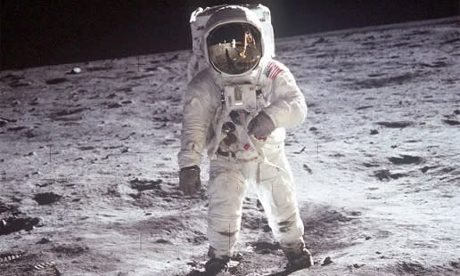 A classic image of Buzz Aldrin in an astronaut suit on the surface of the moon.