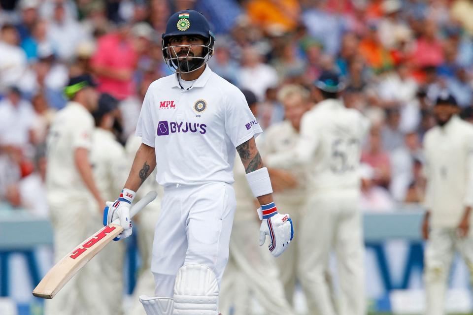 India's captain Virat Kohli walks back to the pavilion after losing his wicket for 20 runs on the fourth day of the second cricket Test match  between England and India at Lord's cricket ground in London on August 15, 2021. (Photo by IAN KINGTON/AFP via Getty Images)