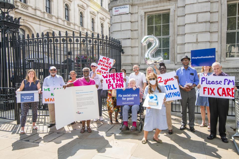 The campaigners took a petition and letter to Downing St (Jamie Lau/Age UK/PA) (PA Media)