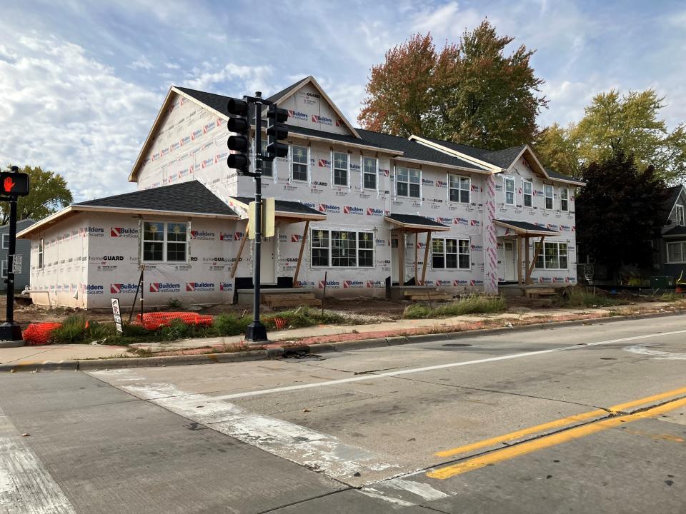 Construction continues on Journey to Adult Success' three-townhouse project at the corner of East Walnut and Baird streets, on Green Bay's east side.