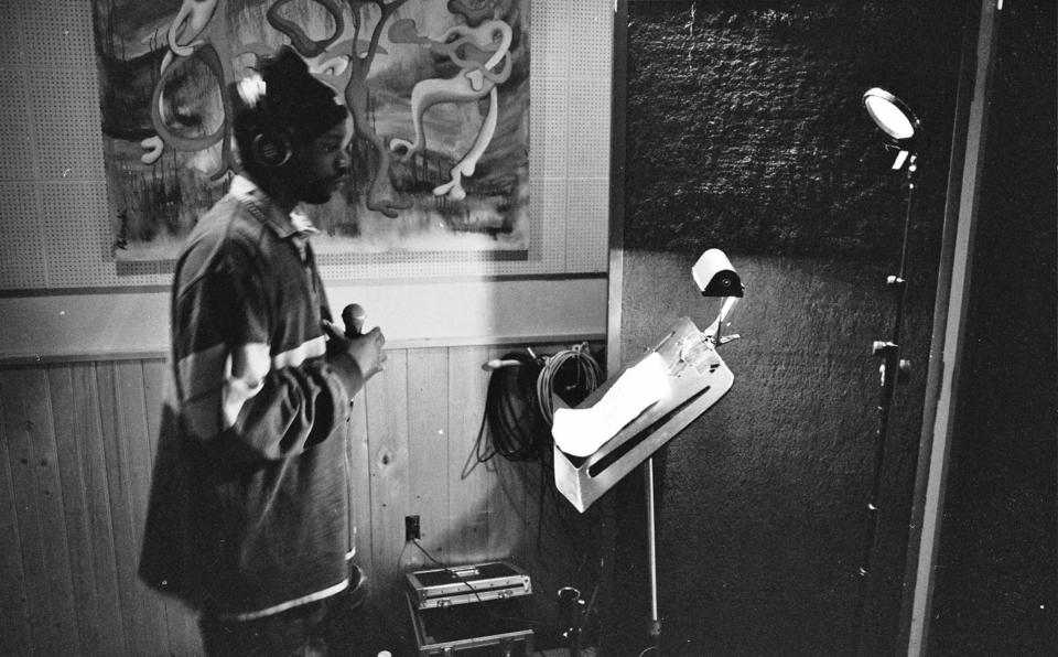 This image provided by @mpozitolbertphotography shows Malik B in studio. The rapper and founding member of The Roots, has died. He was 47. The group announced the death of the Philadelphia-based emcee in a social media post Wednesday. The cause of death has not been released. Malik B, whose real name is Malik Abdul Basit, was a major contributor to the group, which includes Ahmir “Questlove” Thompson and Tariq “Black Thought” Trotter. He appeared on four albums before departing the group in 1999. In the following year, the Roots won their first Grammy. (@mpozitolbertphotography via AP)