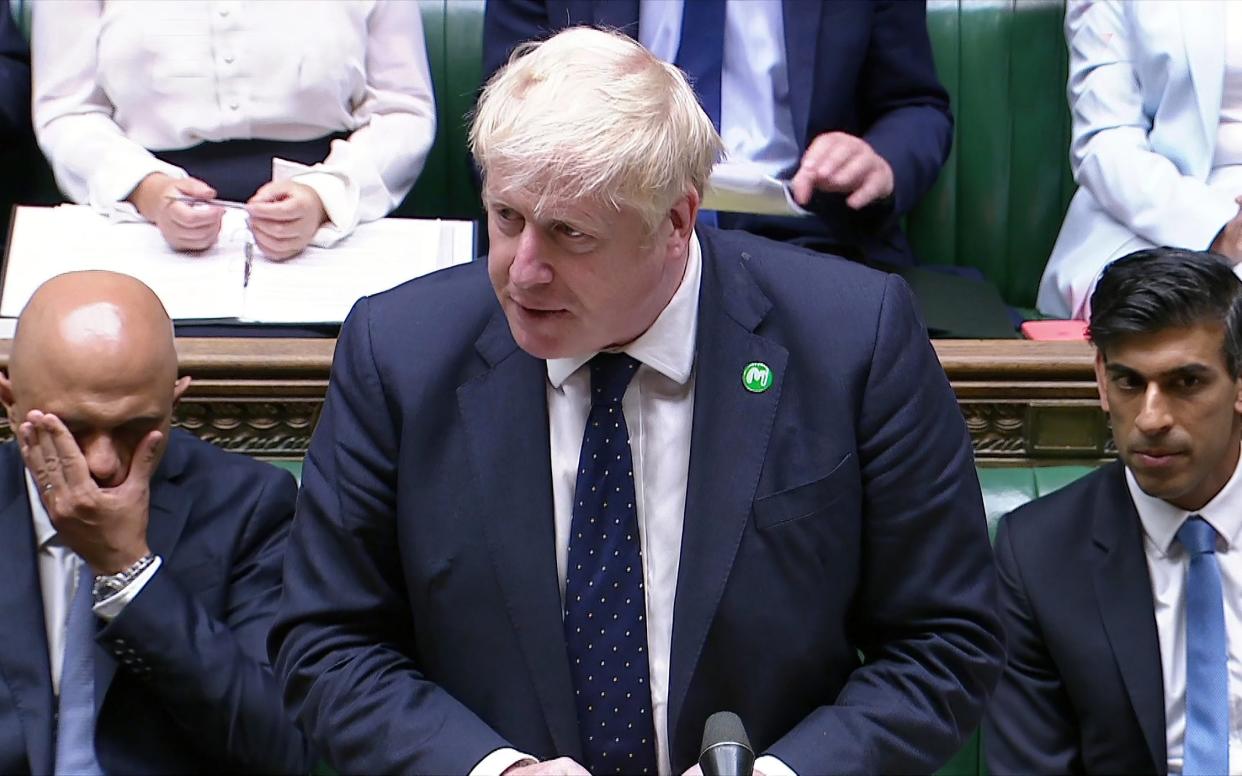 Boris Johnson flanked by Sajid Javid and Rishi Sunak who tendered their resignations within minutes of each other