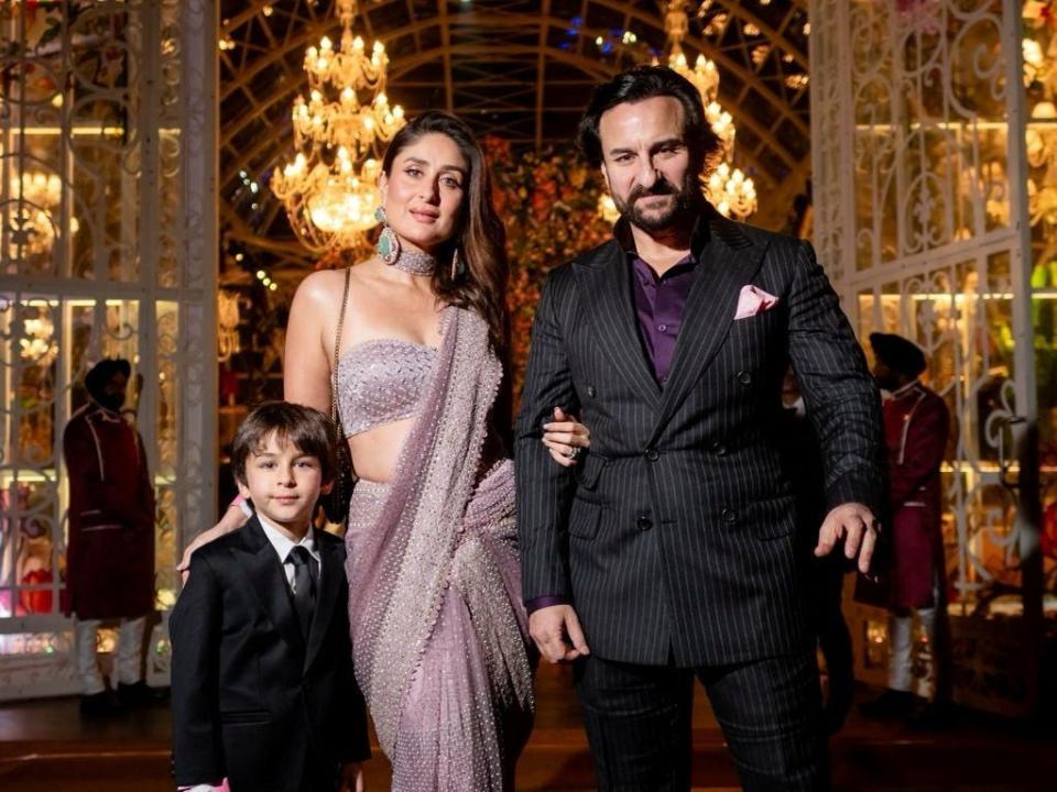 Actors Saif Ali Khan and Kareena Kapoor Khan with their son Taimur Ali Khan pose for a picture during the pre-wedding celebrations of Anant Ambani, son of Mukesh Ambani and Radhika Merchant.