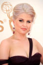 <p>Kelly Osbourne’s classy updo gives her rendition of silver hair an enchanting glow. (Photo: Getty Images) </p>