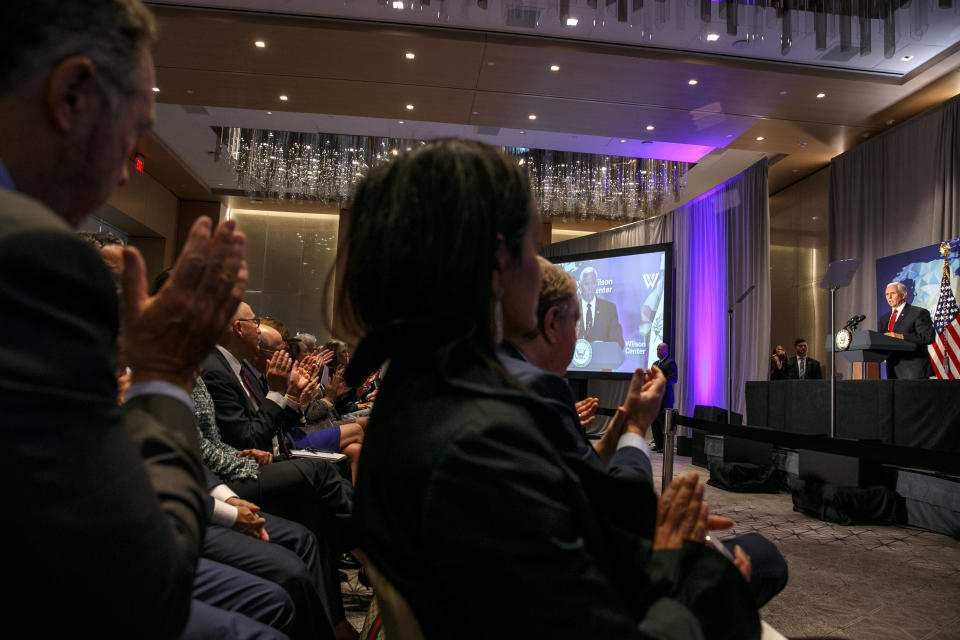 The audience applauds a point made by Vice President Mike Pence as he makes a speech about the US-China relationship, Thursday, Oct. 24, 2019, at the Wilson Center's inaugural Frederic V. Malek Public Service Leadership Lecture, in Washington. (AP Photo/Jacquelyn Martin)