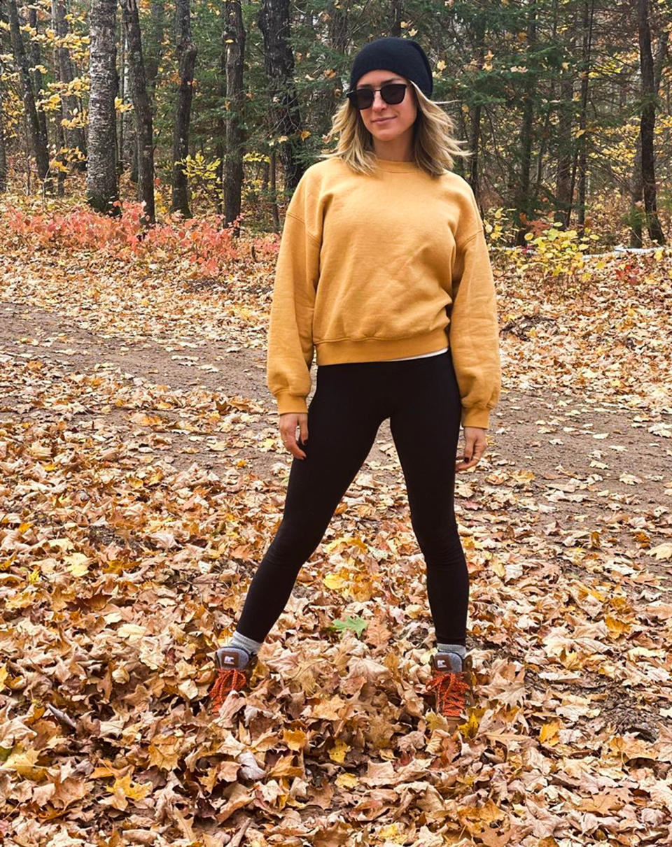 <p>Kristin Cavallari walks through tree-lined trails and enjoys the foliage wearing Sorel Kinetic Conquest boots.</p>