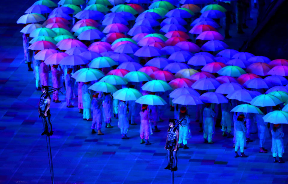 LONDON, ENGLAND - AUGUST 29: Artists perform with umbrellas during the Opening Ceremony of the London 2012 Paralympics at the Olympic Stadium on August 29, 2012 in London, England. (Photo by Mike Ehrmann/Getty Images)