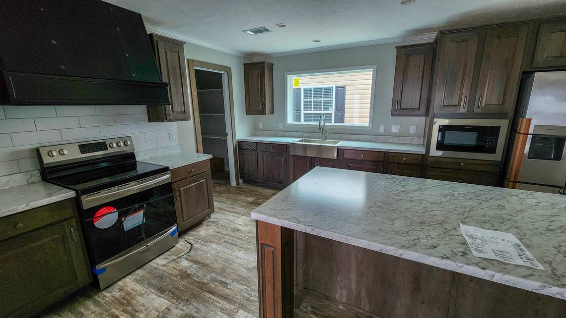 While not the same counter top that the Wrights received, the open kitchen of the “Big Easy” manufactured home sold by Palmetto Homes of Beaufort is bright and has plenty of counter space.