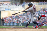 Cleveland Guardians' Josh Naylor hits a two-run homer against the Minnesota Twins in the second inning of a baseball game Tuesday, June 21, 2022, in Minneapolis. (AP Photo/Andy Clayton-King)