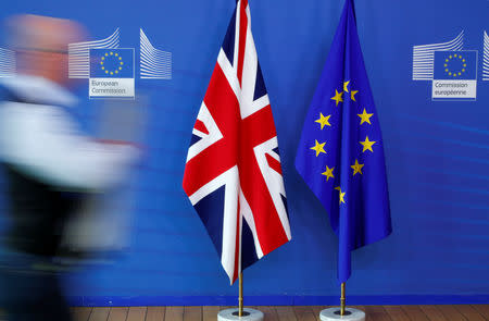 FILE PHOTO - British and EU flags are seen prior to the arrival of British Prime Minister Theresa May and European Commission President Jean-Claude Juncker, ahead of the European Union leaders summit in Brussels, Belgium October 17, 2018. REUTERS/Francois Lenoir