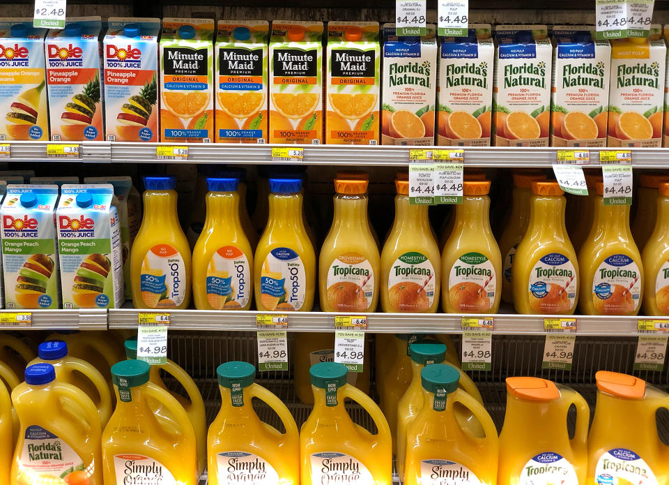 Orange juice cartons sit on a store shelf on October 29, 2018, in San Rafael, California. (Getty Images)