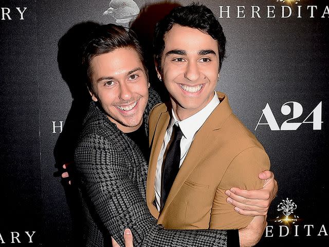 <p>Nicholas Hunt/Getty</p> Nat Wolff and Alex Wolff attends the "Hereditary" New York Screening on June 5, 2018.