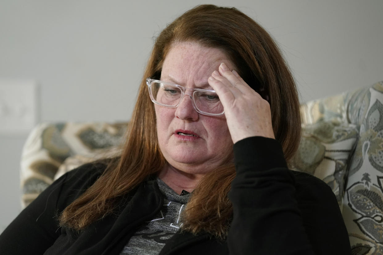 Tracey Ferguson, mother of D.J. Ferguson, speaks with an Associated Press reporter Wednesday, Jan. 26, 2022, during an interview at her home, in Mendon, Mass. A Boston hospital is defending itself after Ferguson's family claimed D.J. was denied a new heart for refusing to be vaccinated against COVID-19, saying most transplant programs around the country set similar requirements to improve patients' chances of survival. (AP Photo/Steven Senne)