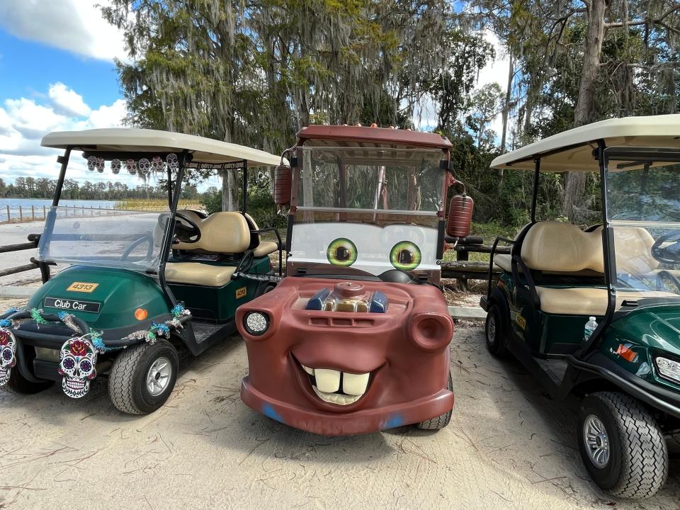 golf cart decorated to look like mater