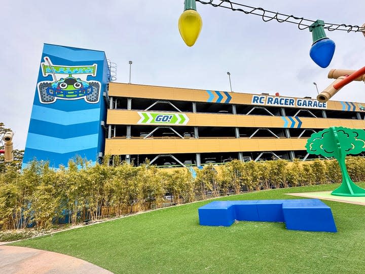 The parking garage at the Toy Story Hotel remained on-theme with RC cars. The garage is blue and tan in color and looks as if a child decorated it with car and racing stickers.