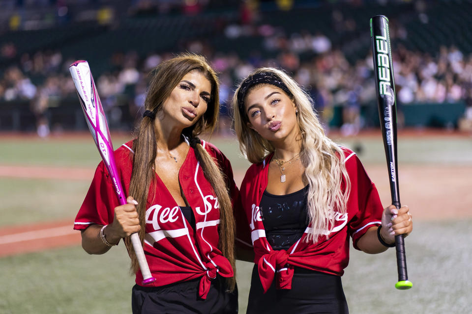 <p>Teresa Giudice and daughter Gia pucker up on Aug. 12 at the Battle for Brooklyn charity softball game to benefit Maimonides Medical Center at Maimonides Park in New York. </p>