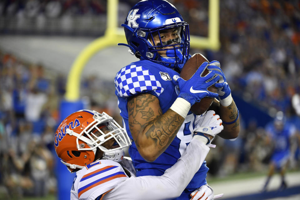 Kentucky tight end Keaton Upshaw (88) makes a catch over the defense of Florida defensive back Brad Stewart Jr. for a touchdown during the second half of an NCAA college football game in Lexington, Ky., Saturday, Sept. 14, 2019. Florida won 29-21. (AP Photo/Timothy D. Easley)