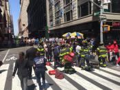 <p>First responders assist at the scene of motor vehicle accident in Times Square, New York City on May 18, 2017. (FDNY via Twitter) </p>