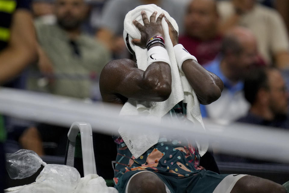 Frances Tiafoe, of the United States, takes a break between games against Ben Shelton, of the United States, during the quarterfinals of the U.S. Open tennis championships, Wednesday, Sept. 6, 2023, in New York. (AP Photo/Charles Krupa)